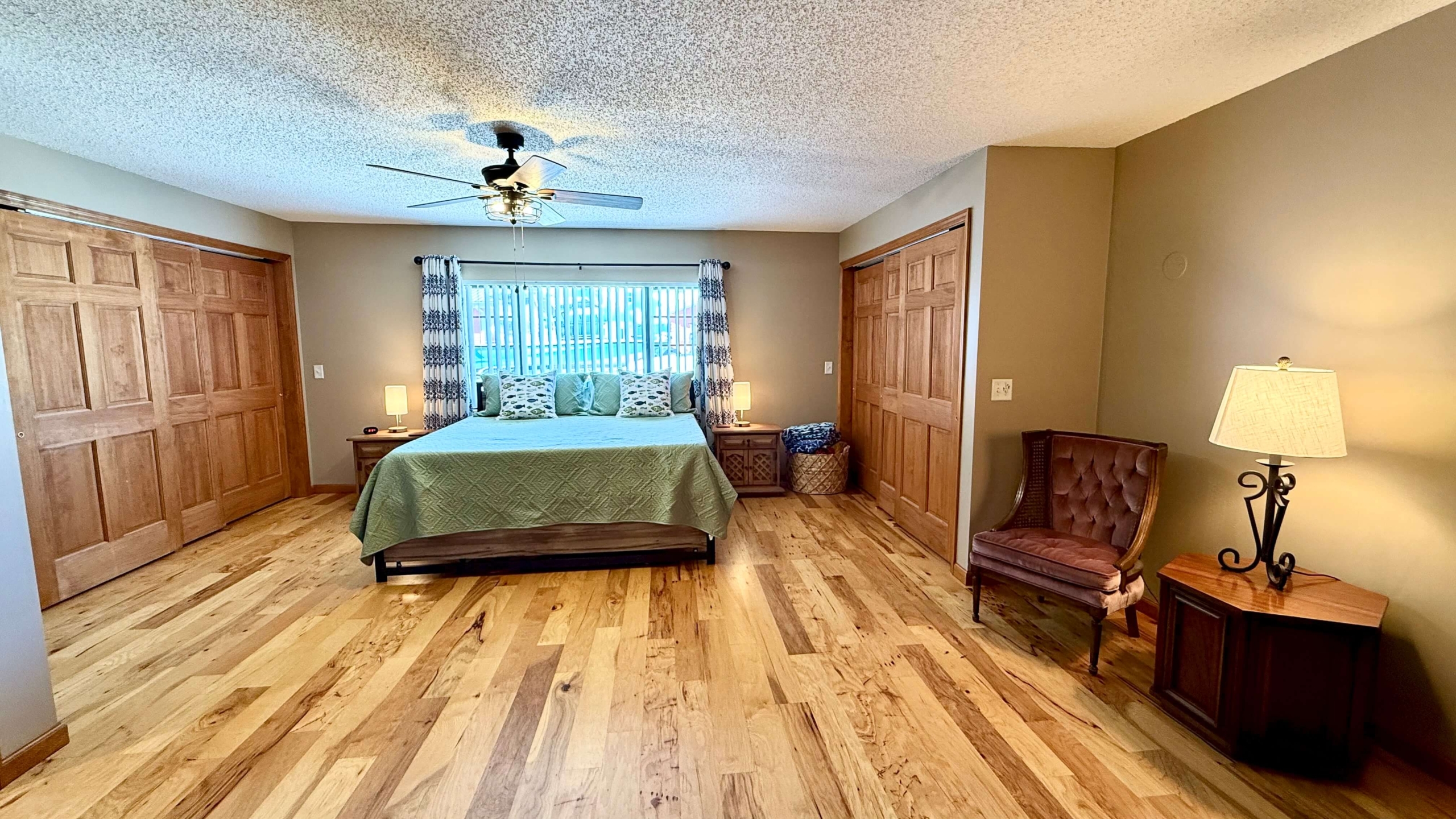 248 Cokesbury Ct Master Bedroom 1 with Hardwood Floors and Kingsized Bed