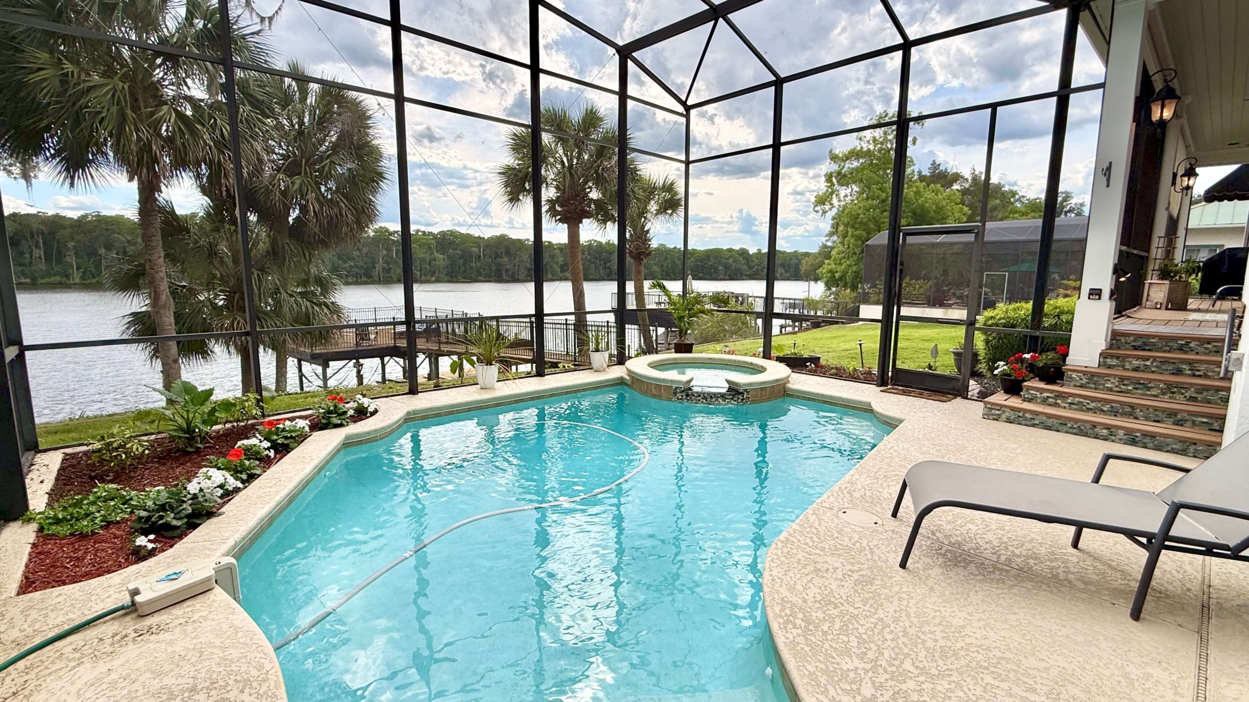 Photo of Pool with Screen Enclosure at 127 River Rd