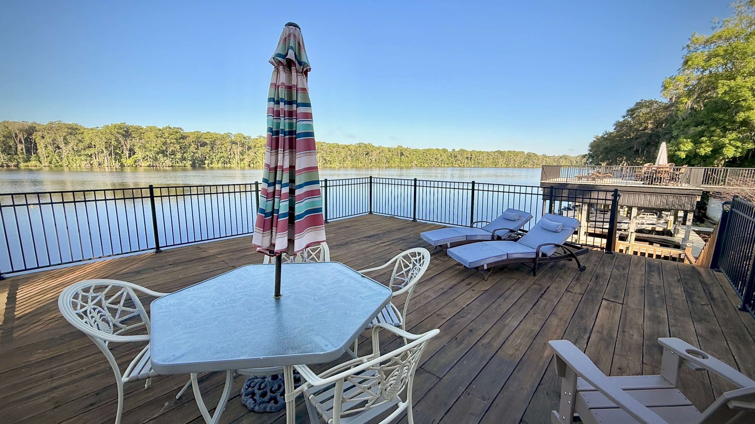 Photo to the River from an Upper Dock at 127 River Rd Satsuma Fl