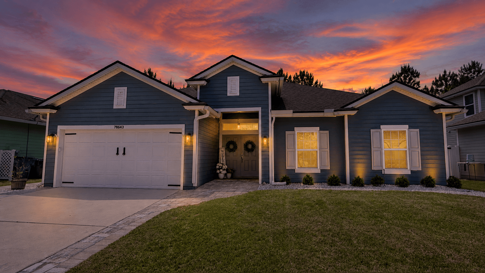 Photo of Sunset over Blue House in Yuleee Fl with a Pool